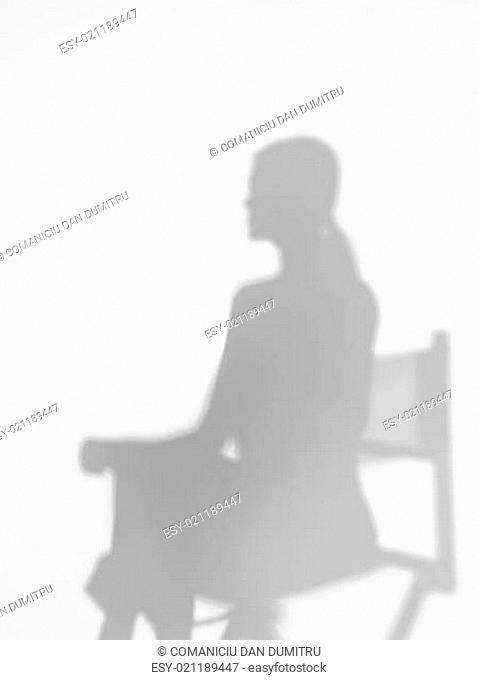 woman on director's chair, silhouette