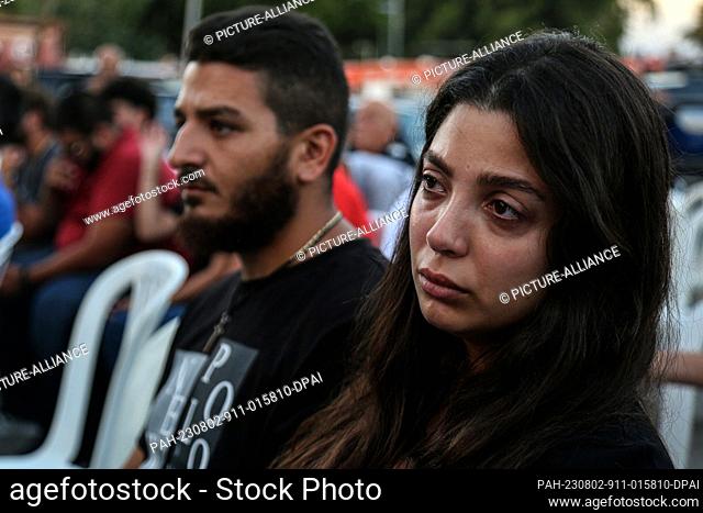 02 August 2023, Lebanon, Beirut: Maria Fares (R), sister of firefighter Sahar who was killed in the 4 August 2020 massive port blast