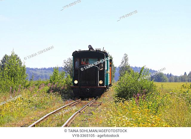 Move21 diesel locomotive 67 manufactured by Valmet Oy approaching flag stop on Jokioinen museum railway in summer. Palomaki, Finland. July 28, 2019
