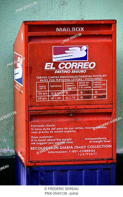 Red post box in Flores, Peten, Guatemala, Central America