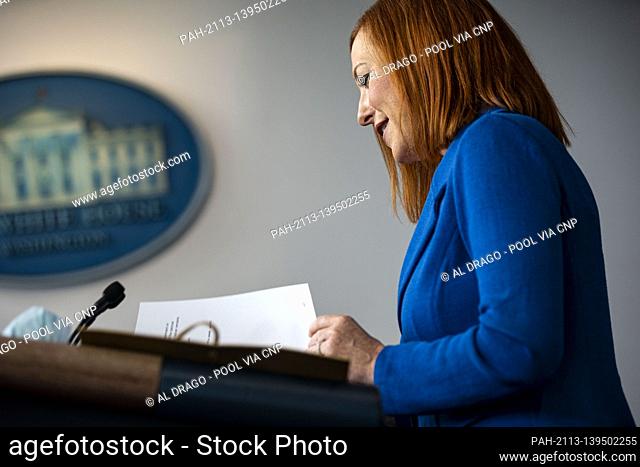 Jen Psaki, White House press secretary, checks her notes during a news conference in the James S. Brady Press Briefing Room at the White House in Washington, D