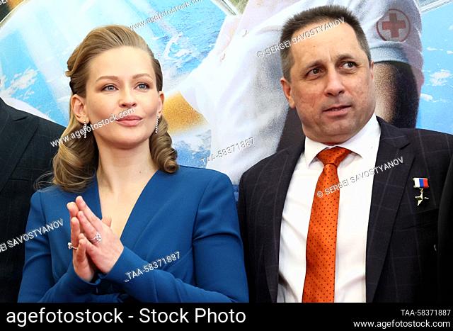 RUSSIA, MOSCOW - APRIL 12, 2023: Russian actress Yulia Peresild (L) and Russian cosmonaut Anton Shkaplerov attend an event at the State Kremlin Palace on...