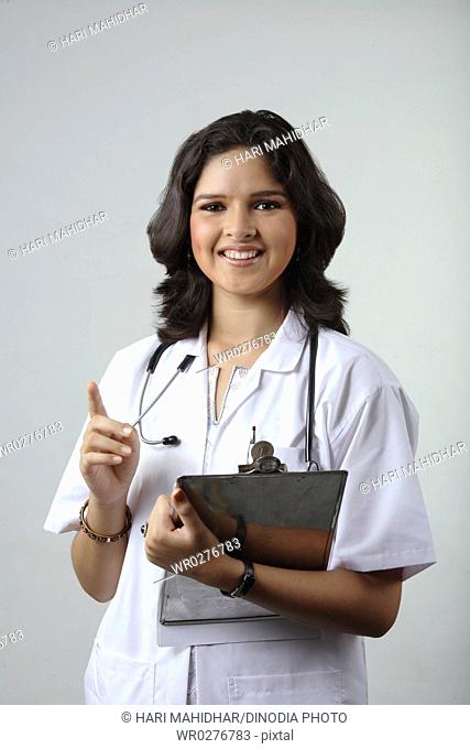 Indian girl dressed as doctor stethoscope around neck holding paper pad MR 372