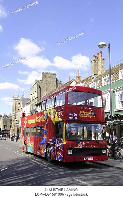 England, Cambridgeshire, Cambridge. A double decker City Sightseeing tourist bus on Bridge Street