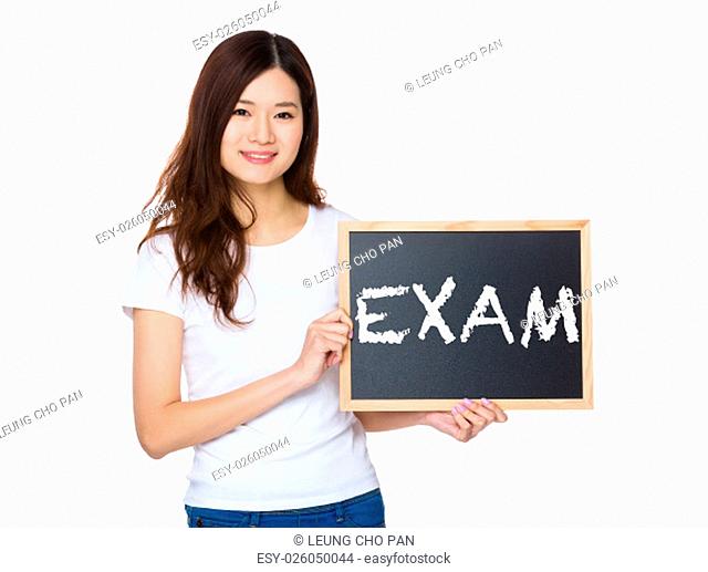 Woman with the chalkboard showing a word exam