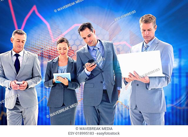 Composite image of business colleagues using their multimedia devices