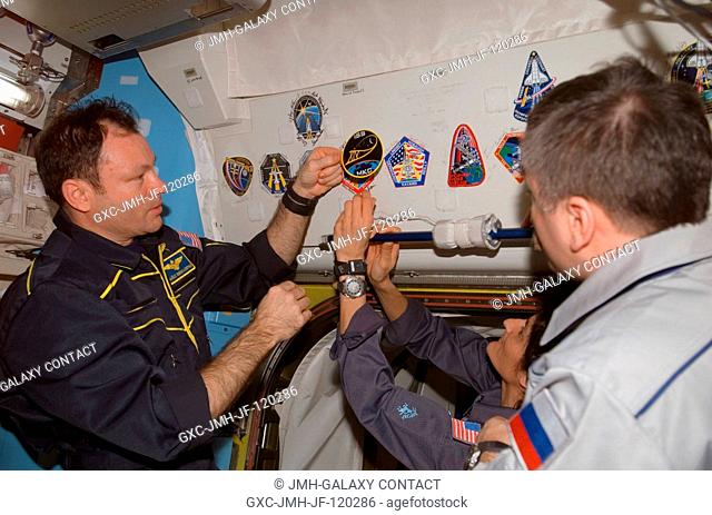 Astronauts Michael E. Lopez-Alegria (left), Expedition 14 commander and NASA space station science officer; Sunita L. Williams