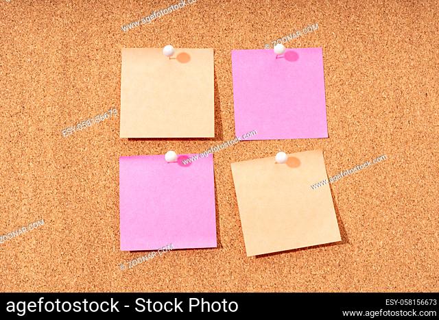 Group of four Blank note on a cork board for adding text and push pin. Mock up