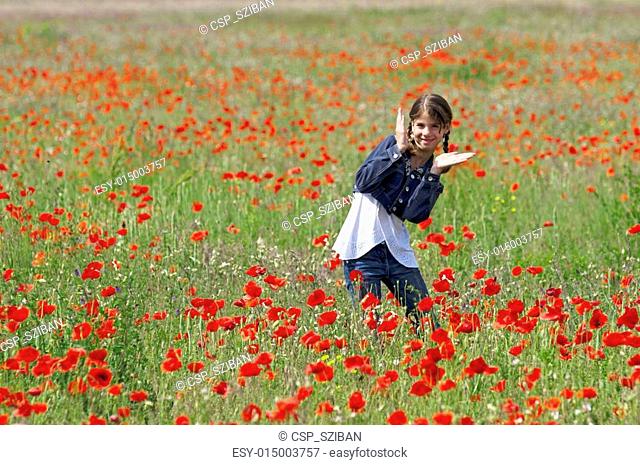 Girl with poppies dancing