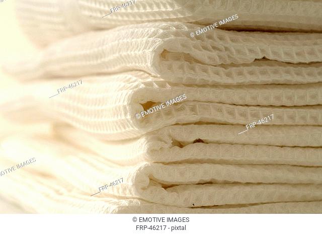 Stacked white towels
