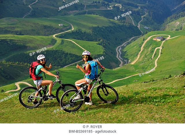 two mountain bikers in the Alps, France, Savoie, Vanoise National Park, Champagny