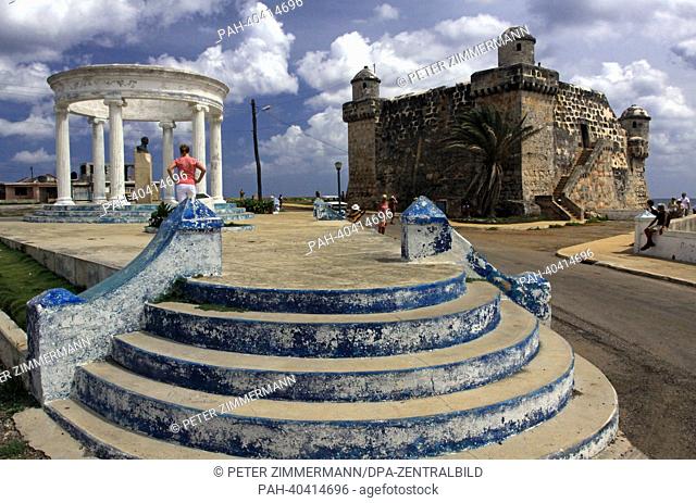 A view of the historic castle of Torreón de Cojímar (R), built in 1649, in the small fishing village of Cojimar, Cuba, 12 April 2013
