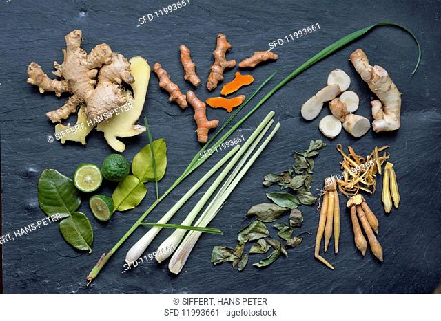 An arrangement of exotic rhizomes, leaves and spices