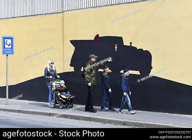 Student Jakub Marek unveiling wall painting dedicated to World War Two Anthropoid mission, commemorating the assassination of SS Obergruppenfuhrer and General...