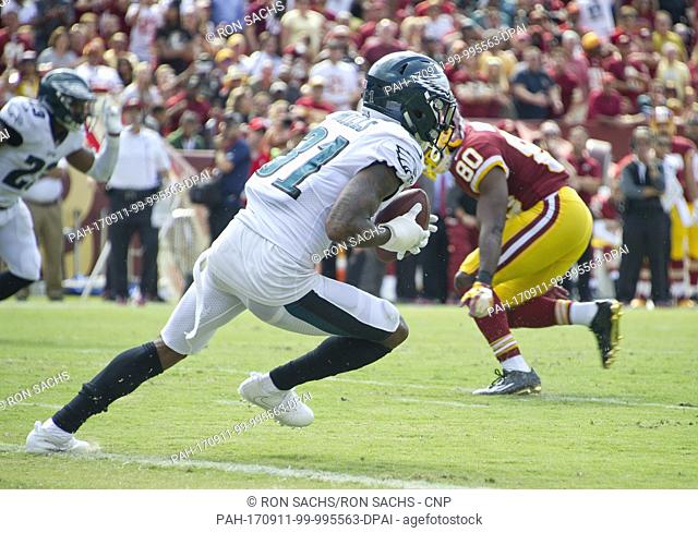 Philadelphia Eagles cornerback Jalen Mills (31) starts his return after intercepting a pass from Washington Redskins quarterback Kirk Cousins (8) that was...