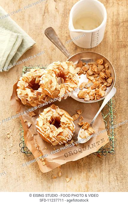 Almond brittle doughnuts made from puff pastry, filled with cr
