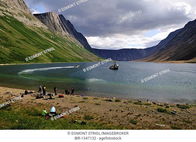 Group of tourists on a beach at North Arm of Saglek Fjord, Torngat Mountains National Park, Newfoundland and Labrador, Canada