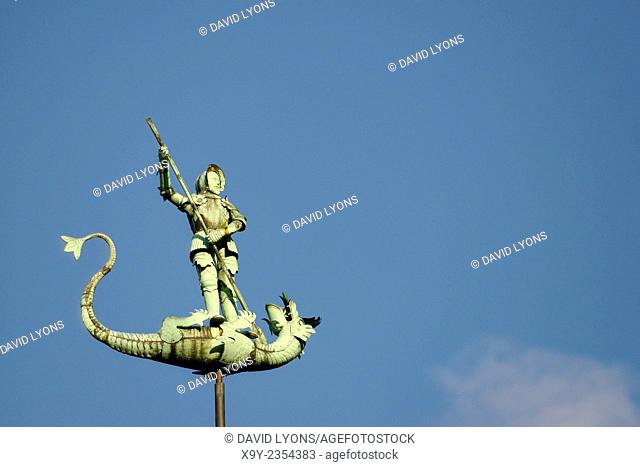 Gdansk Poland. Saint George slaying the dragon. Statue on top of spire of 15th C. St. Georges Hall in the Old Town