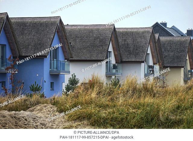 10 November 2018, Schleswig-Holstein, Heiligenhafen: Newly built houses of the Strand Resort on the Steinwarder. The harbour town on the Baltic Sea in the...