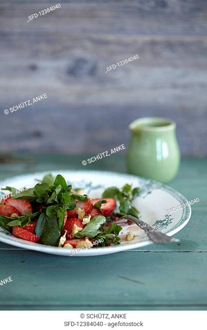Stinging nettle salad with strawberries