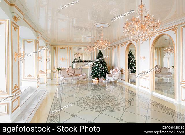 Calm image of interior Classic New Year Tree decorated in a room with a fireplace