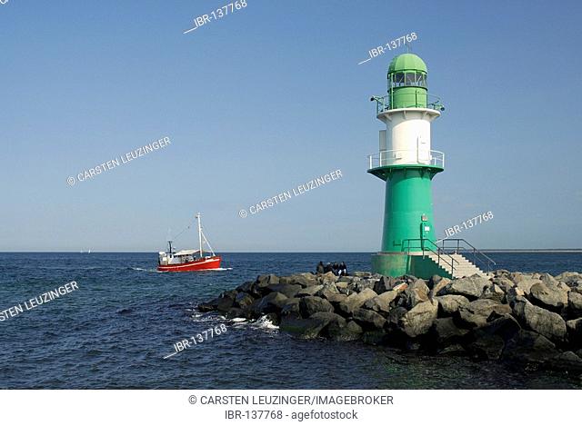 Lighthouse at the western mole of the harbour entrance of Warnemuende, Mecklenburg-Vorpommern, Germany
