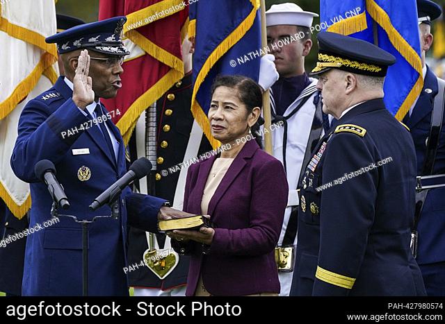 United States Air Force General Charles Q. Brown, Jr, incoming Chair, Joint Chiefs of Staff, left, is joined by his wife Sharene Guilford Brown, center