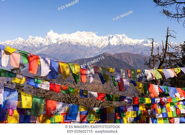 Kanchenjunga Mountain with Buddhist prayer flags in the foreground