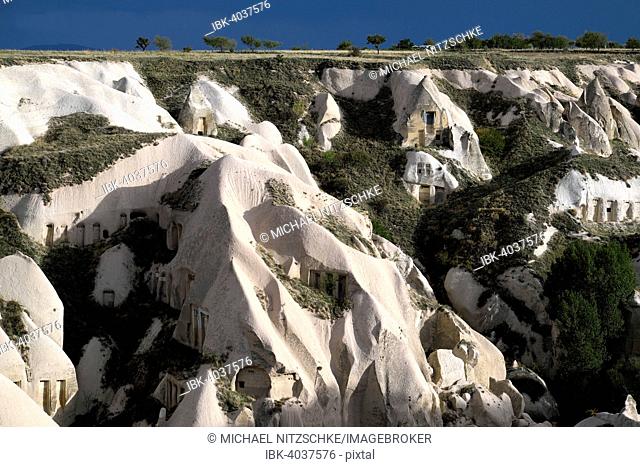 Tufa formations with cave dwellings, Pigeon Valley, Güvercinlik, Nevsehir Province, Cappadocia, Turkey
