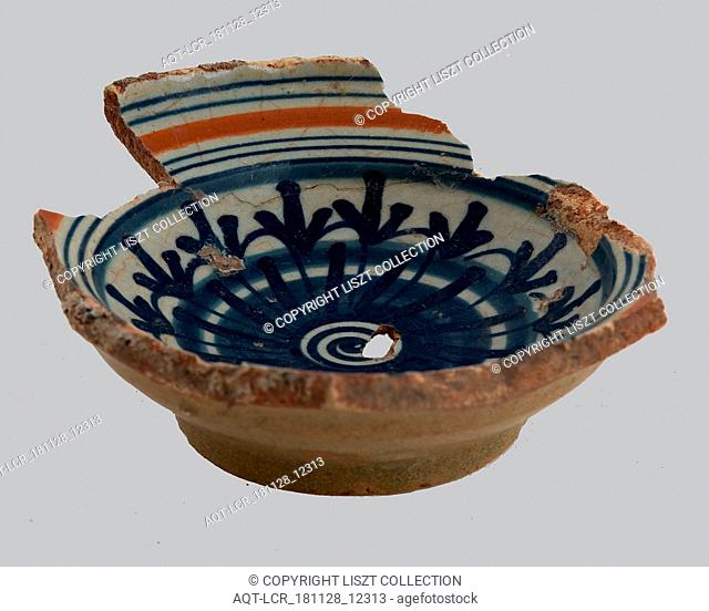 Fragment of majolica salt scale, rosette in the mirror, along the flag lines in orange and blue, salt barrel tableware holder soil find ceramic pottery tin...
