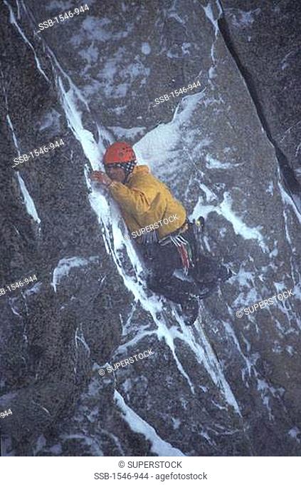 Person climbing a mountain, Donner Summit, California, USA