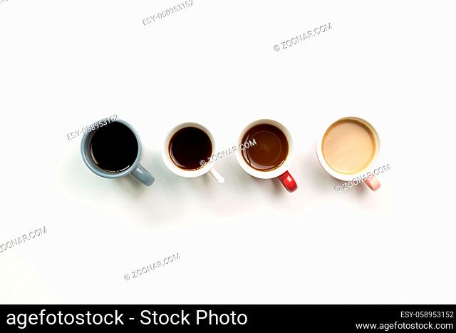 Various cup of coffee on white background. top view, copy space