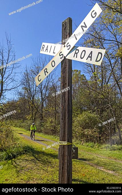 Martinton, West Virginia - A bicyclist on the Greenbrier River Trail. The 78-mile rail trail runs along the Greenbrier River