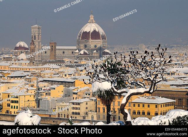 Cathedral of Santa Maria del Fiore (Duomo) and giottos bell tower (campanile), in winter with snow, Florence, Tuscany, Italy