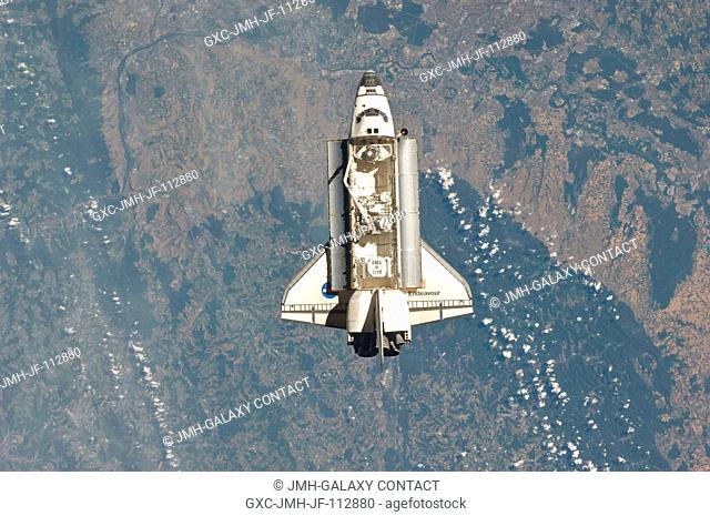 One of the Expedition 27 crew members aboard the International Space Station (ISS) recorded this image of the space shuttle Endeavour as the two spacecraft made...