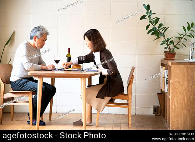 Senior couple enjoying wine