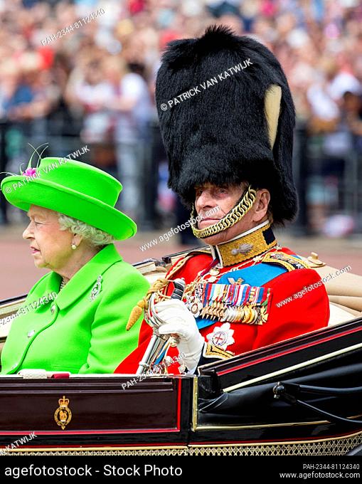 Queen Elizabeth and Prince Philip the Duke of Edinburgh attend Trooping the colour the Queen's birthday parade at Buckingham Palace in London, United Kingdom
