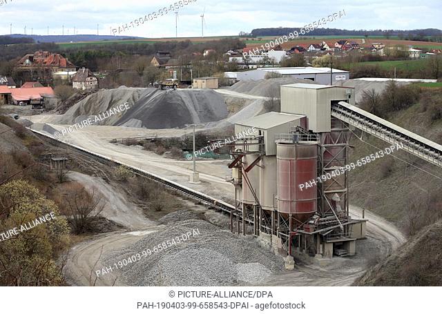 26 March 2019, Bavaria, Aub: Conveyor belts run through a ballast factory. Waste and chemicals are said to have been disposed of illegally in the gravel plant