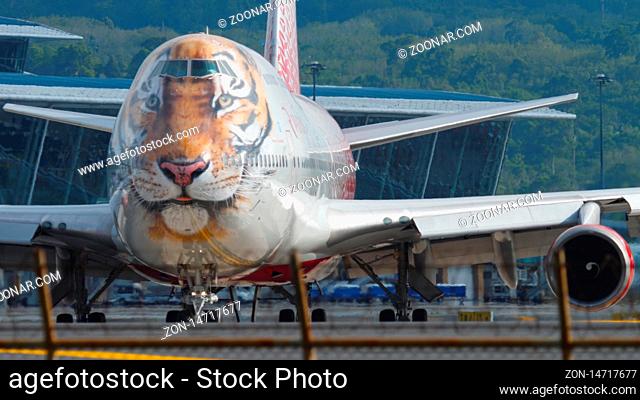 PHUKET, THAILAND - DECEMBER 2, 2018: Rossiya Boeing 747 (Caring for Tigers together Livery) waiting start before departure from Phuket airport