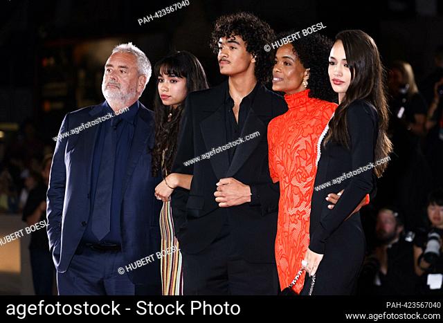 Luc Besson, Virginie Silla, Sateen Besson, Mao Besson, Thalia Besson and Shanna Besson attend the premiere of 'Dogman' during the 80th Venice International Film...