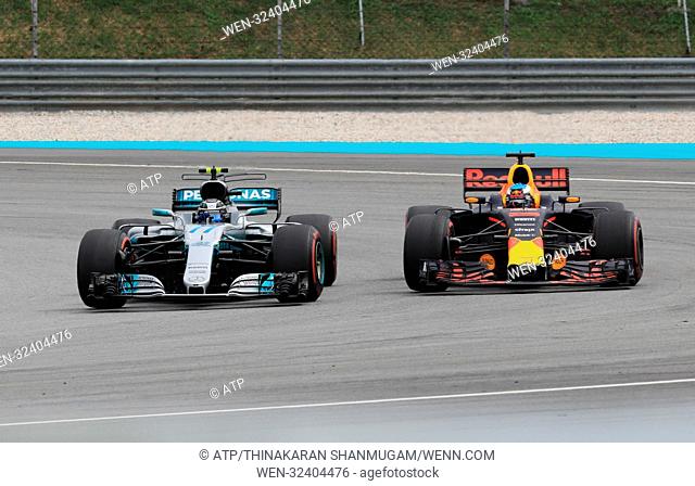 Formula 1 Malaysian Grand Prix - Race Day Featuring: Valtteri BOTTAS, Daniel RICCIARDO Where: Sepang, Selangor, Malaysia Credit: ATP/Thinakaran Shanmugam/WENN