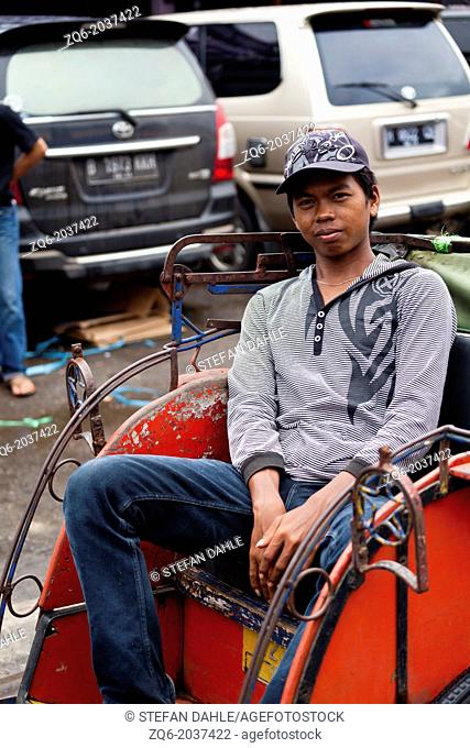 Rikshaw Driver in Banjarmasin, Indonesia