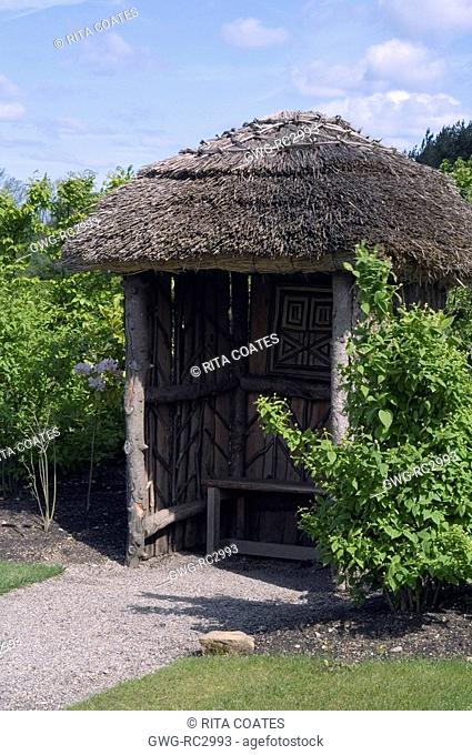 THE RUSTIC HIDEAWAY IN THE VICTORIAN GARDEN AT HARLOW CARR GARDENS