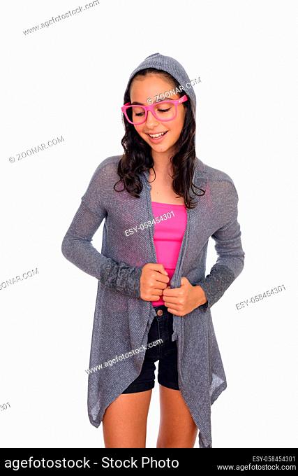 Studio shot of young beautiful teenage girl as nerd with eyeglasses isolated against white background