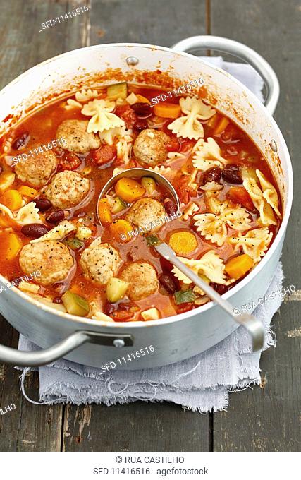 Minestrone with meatballs and farfalle