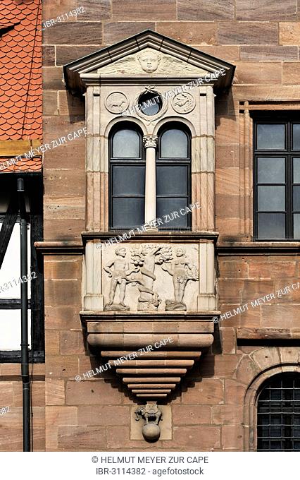 Bay window with a relief of the Fall of Man, on the facade of Tucher Mansion, built 1533-1544