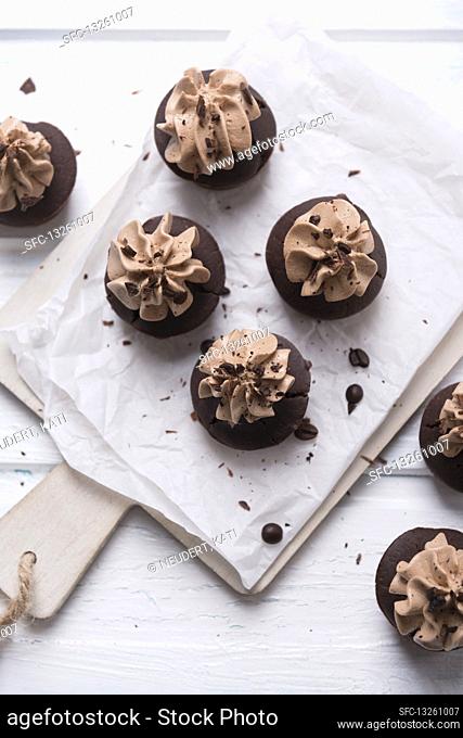 Vegan coffee and chocolate cupcakes with nougat cream