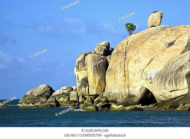 Balancing boulder on a headland, Magnetic Island off Townsville, North Queensland, Australia