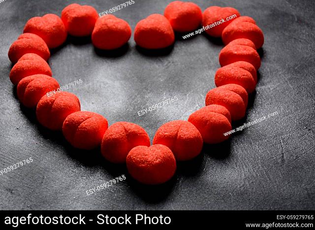 Heart-Shaped red Marshmallows Colored sweet chewy candies.Wedding or Valentine's Day concept