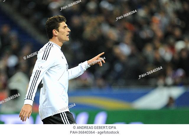 Germany's Mario Gomez gestures during the international friendly soccer match France vs. Germany at the Stade de France in Paris, France, 06 February 2013